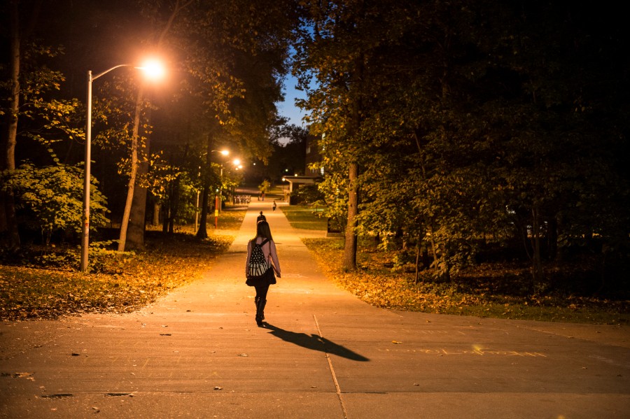 SIU student walking on campus at night