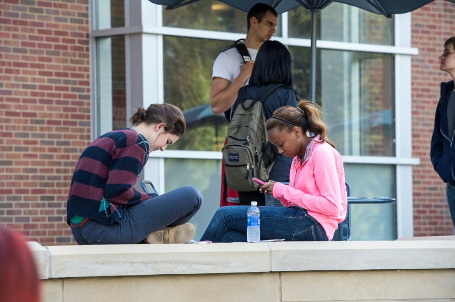 SIU students hanging out in front of  morris library